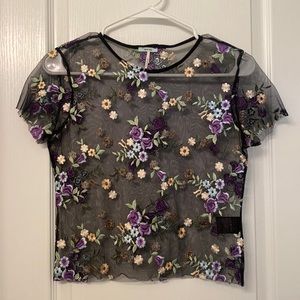 Mesh floral embroidered crop top.